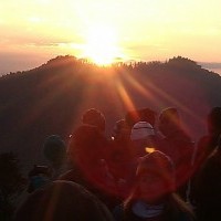 A panoramic view of the sunrise over the Annapurna Himalayas, as seen from Poon Hill, a popular trekking destination in the Ghorepani Ghandruk circuit.
